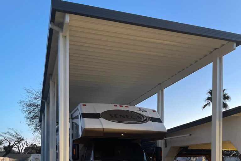 An RV shade cover / large vehicle carport in use