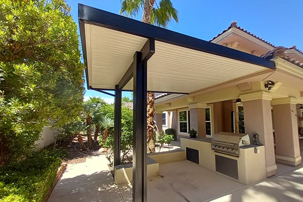 Photograph of a solid home patio cover